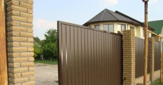 Купить откатные ворота из профнастила Саянск, цена от 1755 руб.